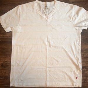 Levi’s Women’s white striped shirt with pale yellow
Stripes, size large